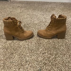 Ankle boots. Tan never been wore. Me too is the brand